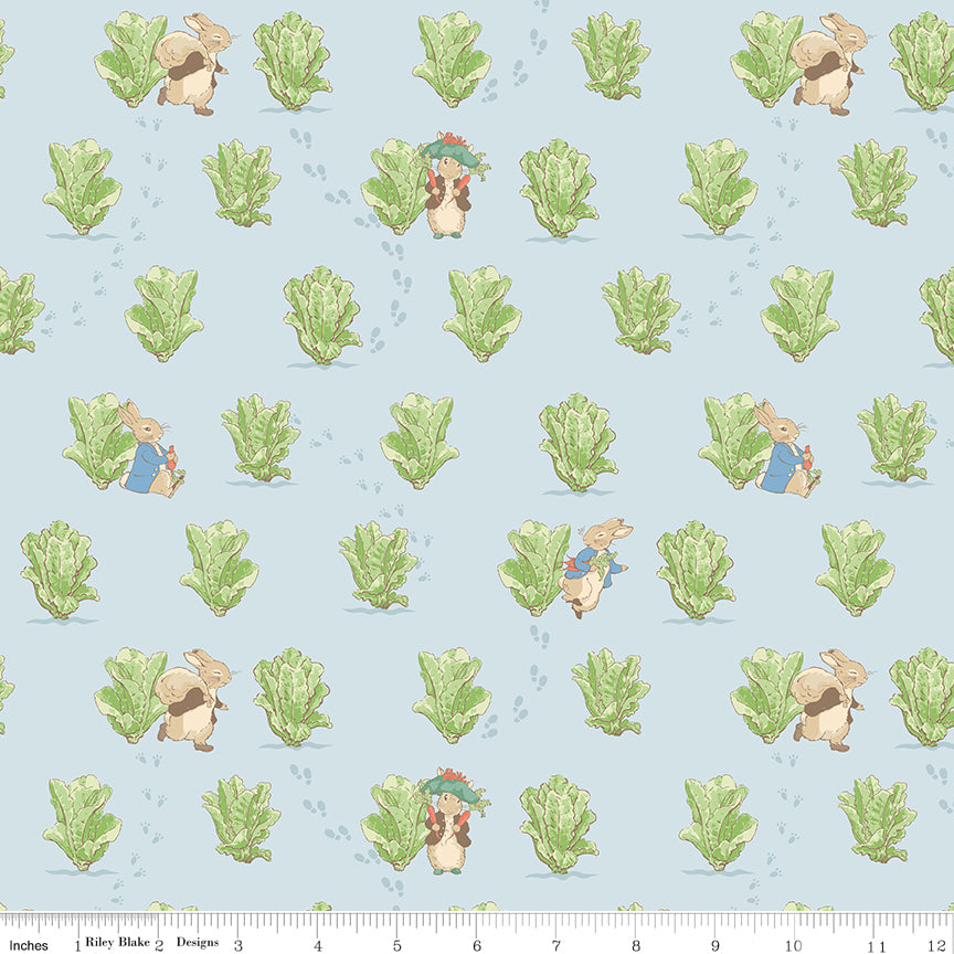 Peter Rabbit™ and Benjamin Bunny™ Lettuce Patch Blue Fabric