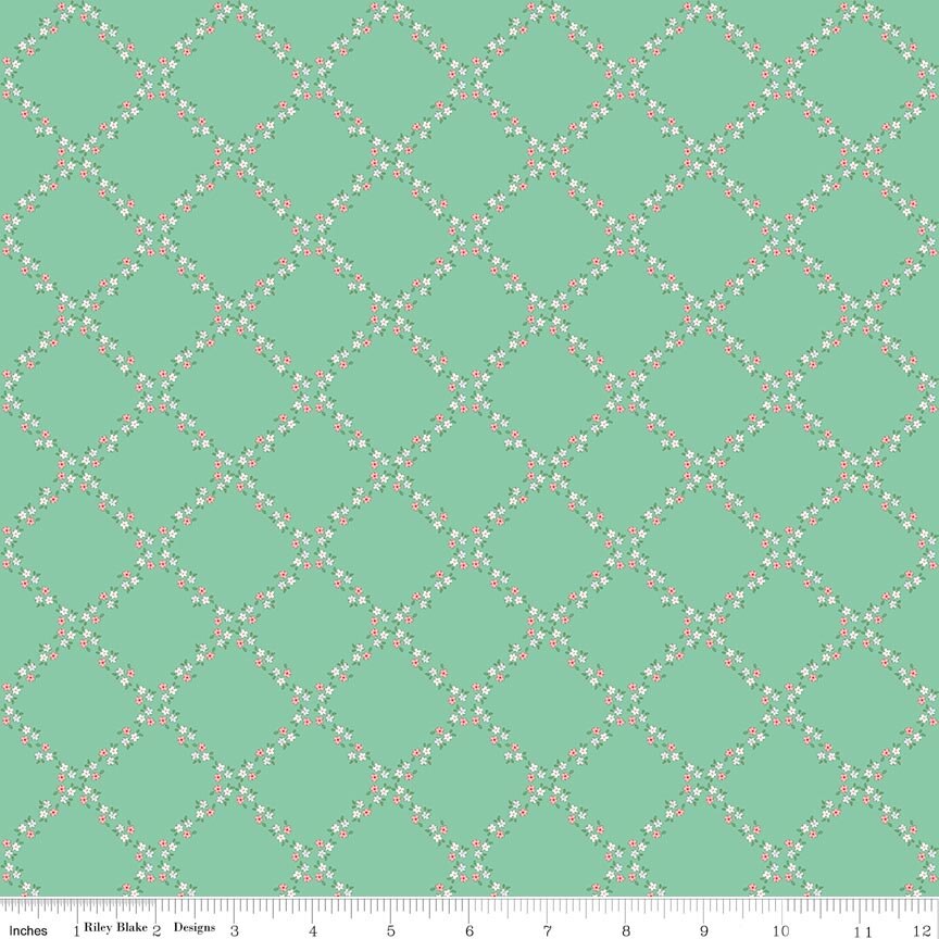 Whimsical Woodland Lattice Green Fabric
